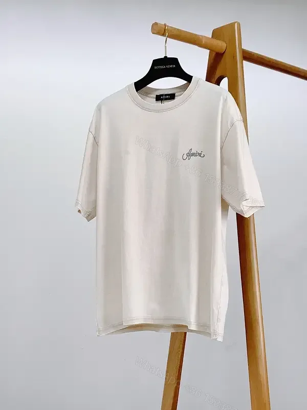 View 1 of White Cotton Tee Minimal Logo Short Sleeve Shirt
