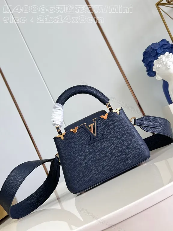 View 1 of Navy Leather Bag with Gold LV Accents