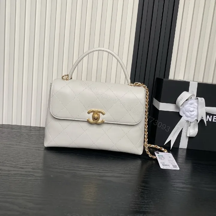 View 1 of White Quilted Mini Leather Bag with Gold Chain – Luxe Compact Style
