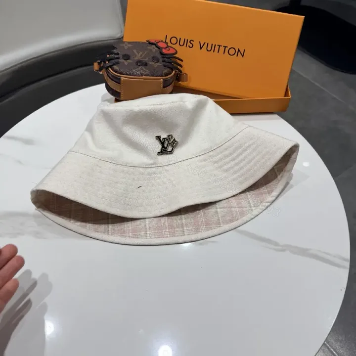 View 1 of Soft-Tone Beige Cotton Hat with Signature Accent