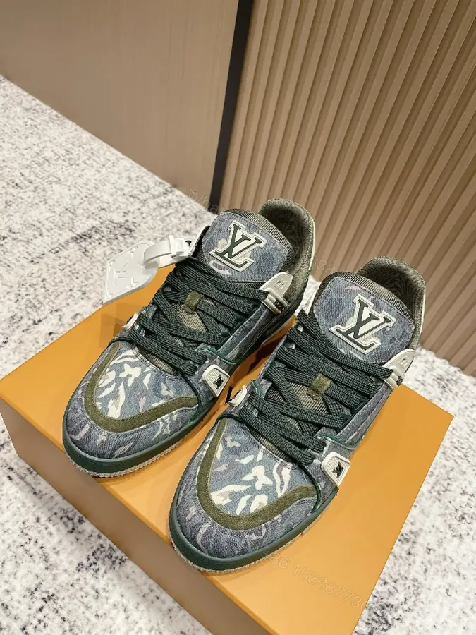 View 1 of Denim Textured Sneaker with LV Detailing, Modern Couture Outdoors