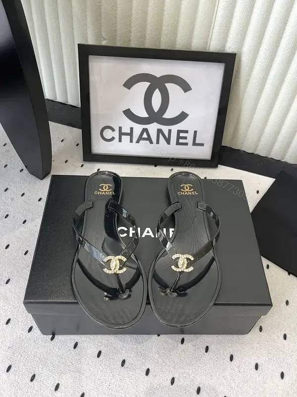 View 1 of Black Leather Plastic Sandals Classic Gold Chanel Logo Sandals