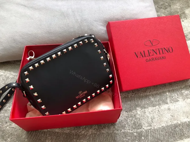 View 1 of Rockstud Crossbody: Compact, Edge-Luxe Leather Bag