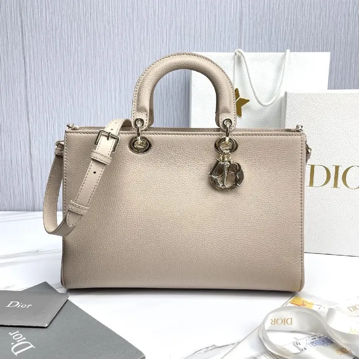 View 1 of Soft-Texture Satchel in Pebbled Leather with Signature Charms