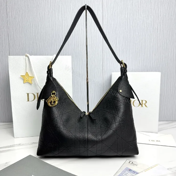 View 1 of Black Leather Shoulder Bag with Gold Charm, Practical Chic