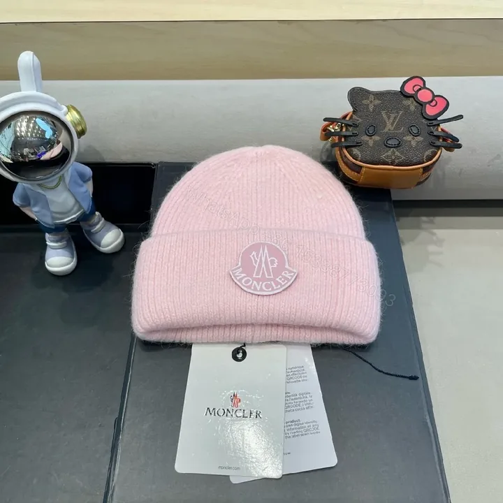 View 1 of Soft Pink Wool Beanie: Luxe Moncler Patch, Cozy Everyday Wear