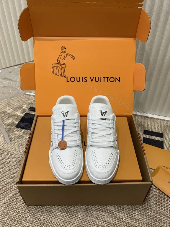 View 1 of White Leather Sneakers: Signature LV Detailing, Everyday Luxury