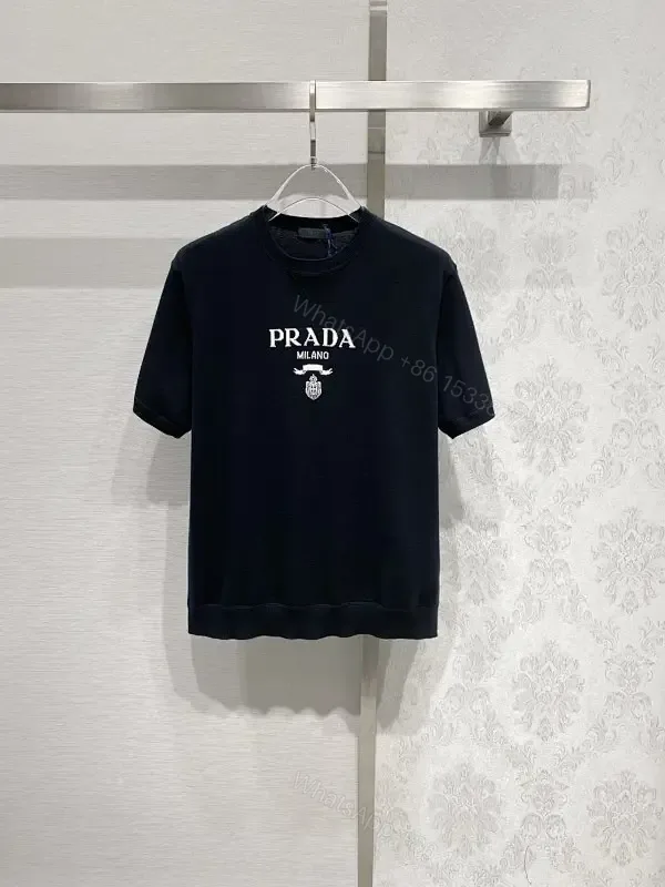 View 1 of Minimalist Cotton Tee with Crest – Elevated Everyday Essential