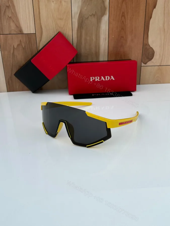 View 1 of Prada Sport Sunglasses Grey Yellow Plastic