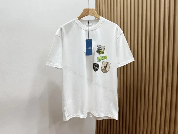 View 1 of Neutral Patchwork Tee: Designer-Emblem Graphic Essential