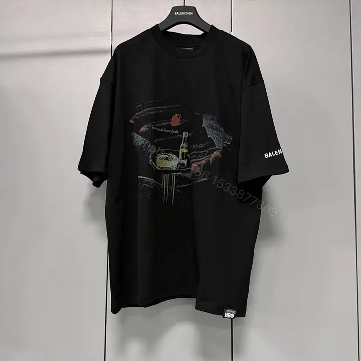 View 1 of black cotton oversized tee with graphic print, designer-inspired luxury casual