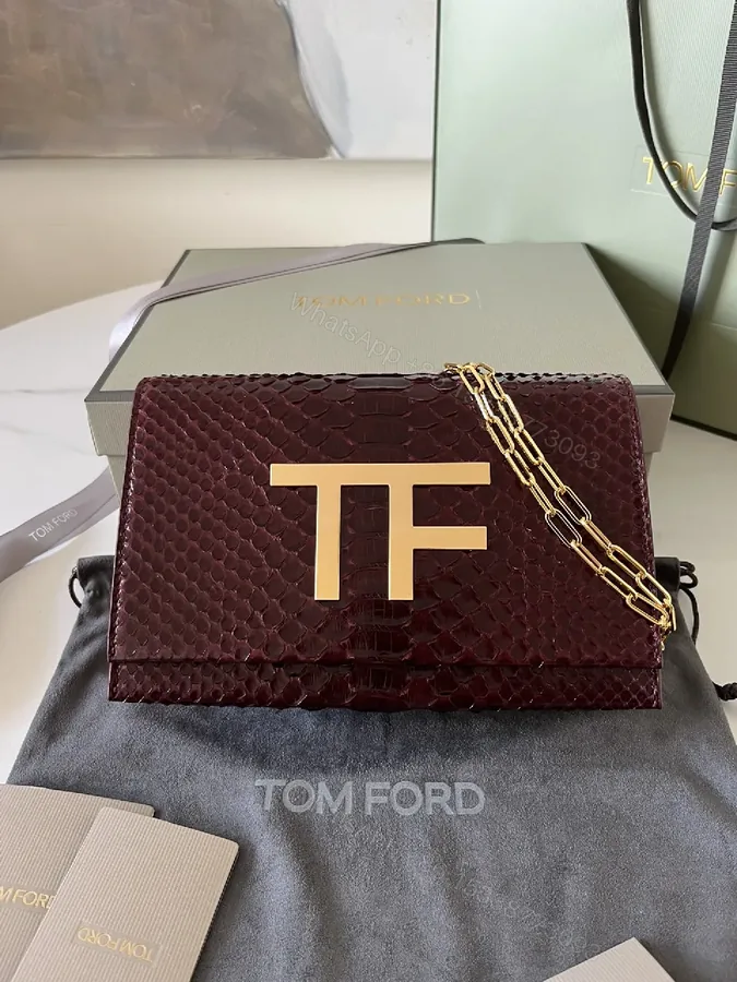 View 1 of Burgundy Python Textured Clutch with TF Gold Hardware