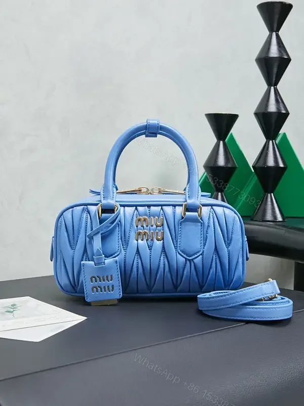 View 1 of Bright Blue Quilted Structured Satchel with Top Handles Analogous to Miu Miu-style Gold Hardware Bag