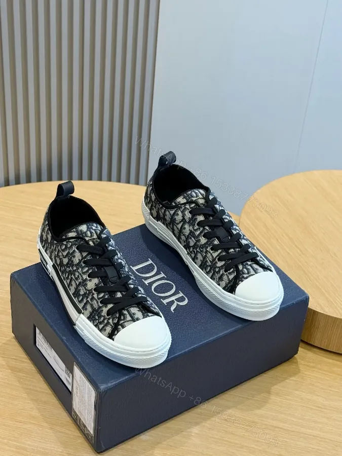 View 1 of Black & White Monogram Sneaker: Luxe Everyday Comfort
