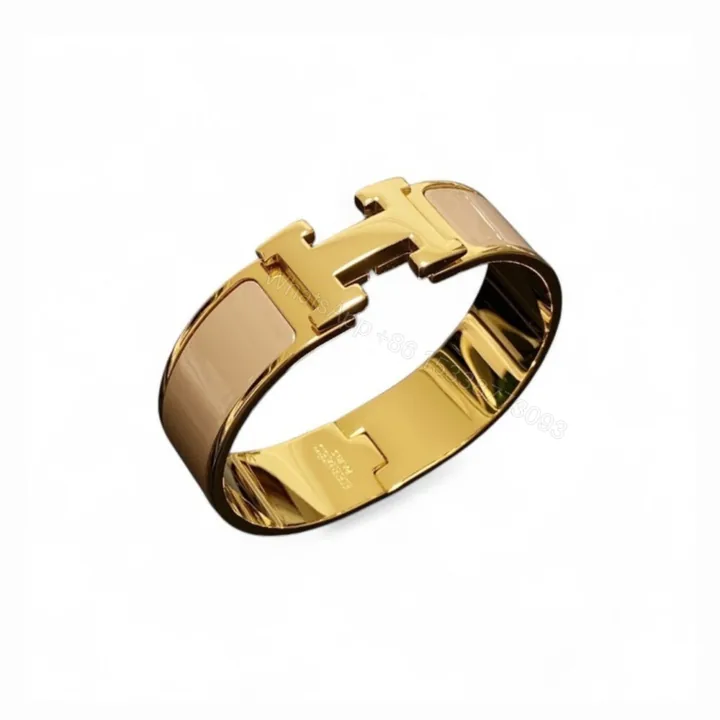 View 1 of Hermes Clic H Wide Bracelet Gold & Beige