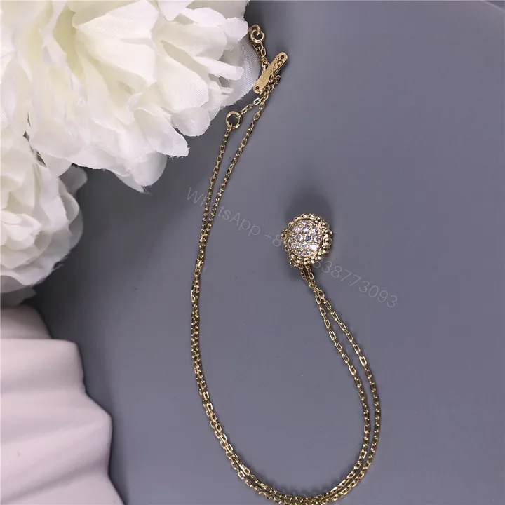 View 1 of Van Cleef Arpels Perlee Diamond Pendant Necklace 18K Yellow Gold