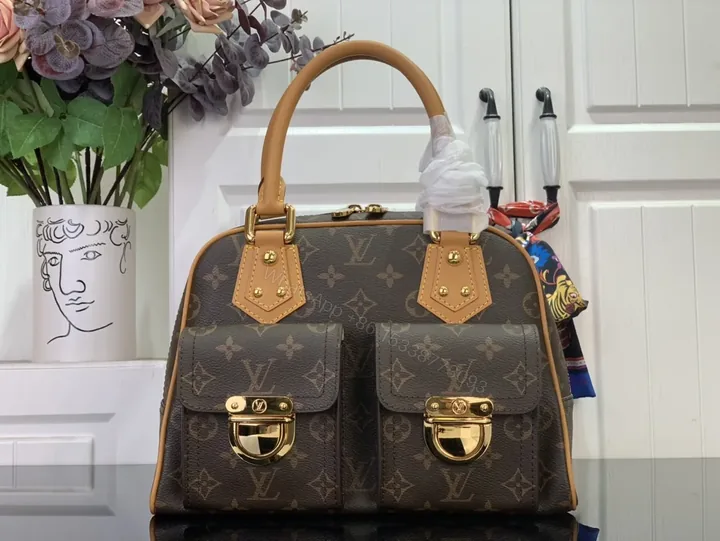 View 1 of Structured Luxury Monogram Handbag with Gold Hardware and Leather Trim