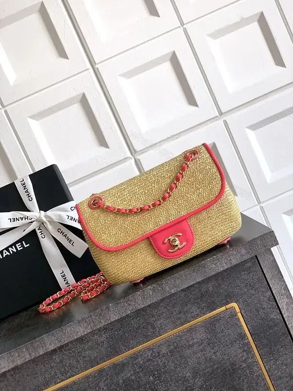 View 1 of Pink Trim Straw Bag with Chain Accent Compact Everyday Luxe