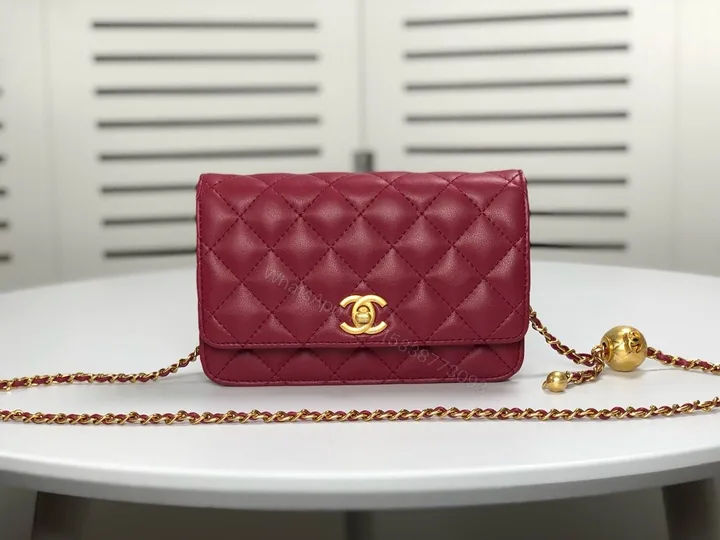 View 1 of WALLET ON CHAIN Grained Shiny Calfskin & Gold-Tone Metal Dark Burgundy