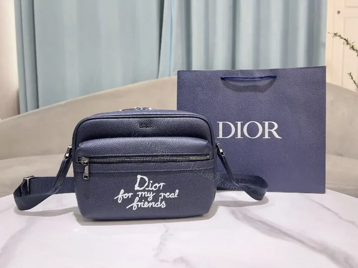 View 1 of Blue Leather Crossbody: Compact Luxury with Playful Edge