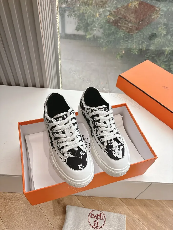 View 1 of Hermes Women Black White Canvas Sneakers