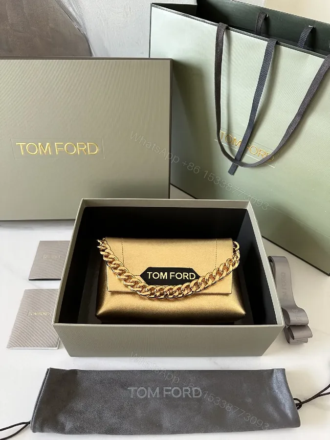 View 1 of Glossy Gold Chain Wallet in Luxe Leather