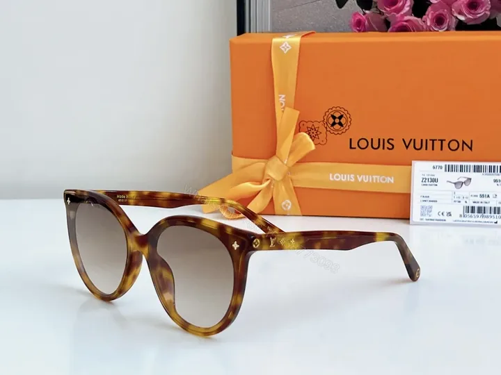 View 1 of Tortoise Frame Sunglasses with LV Detailing, Lightweight, UV400
