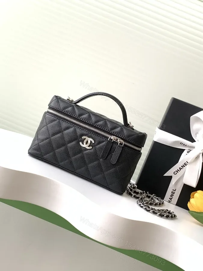 View 1 of Quilted Black Calf Leather Compact Handbag - Chic Versatile Luxury