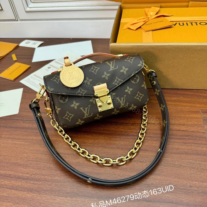 View 1 of Louis Vuitton Pochette Métis East West Monogram Canvas
