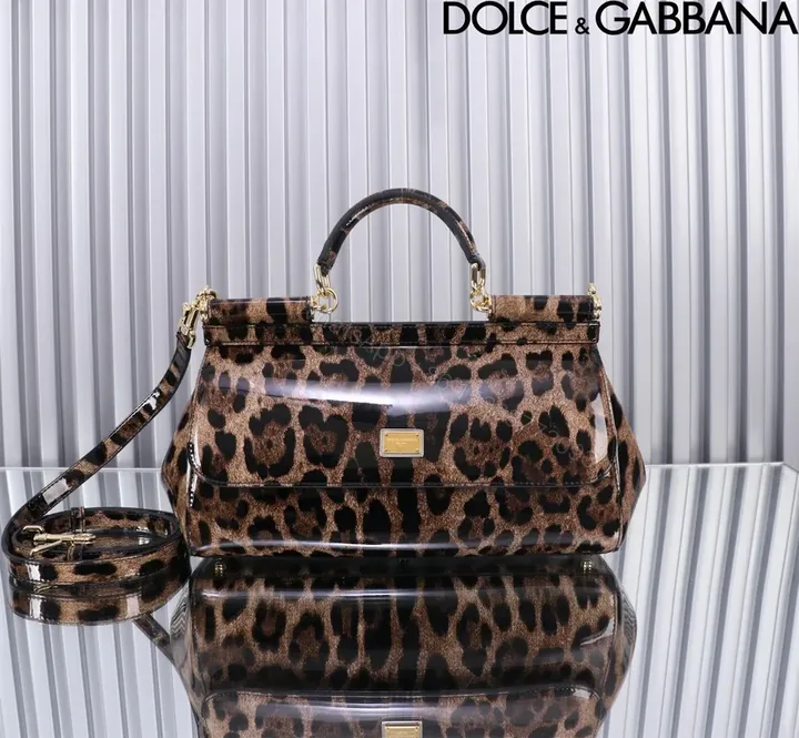 View 1 of Leopard Luxe Handbag: Structured Black-Toned Leather, Glam Statement Tote
