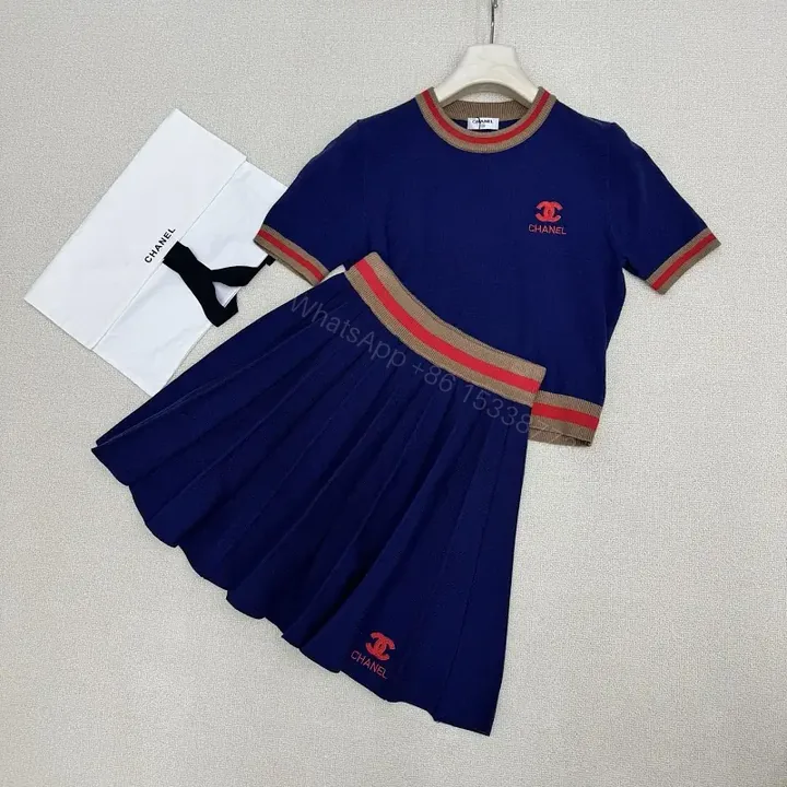 View 1 of Navy Knit Set: Pleated Midi Skirt & Striped-Detail Top