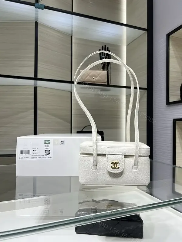 View 1 of Chic Pebbled Leather Compact Handbag - Structured, Versatile, Everyday Elegance