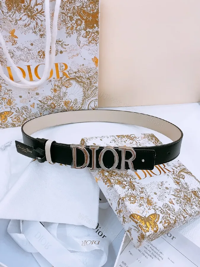 View 1 of Chic Black Leather Belt with Logo Buckle—Statement Accessory