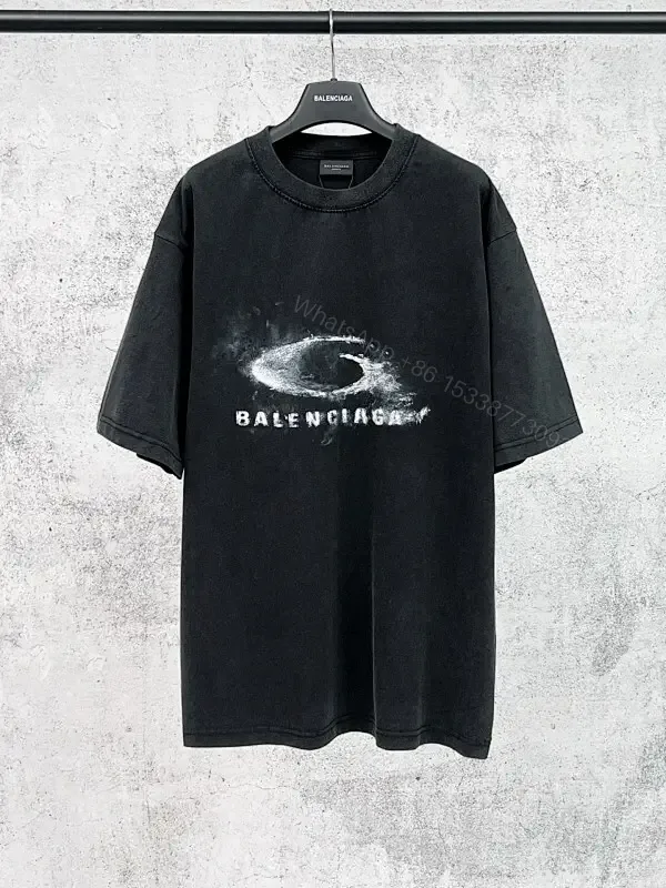 View 1 of Oversized Black Cotton Tee with Distressed Logo – Avant-Garde Streetwear