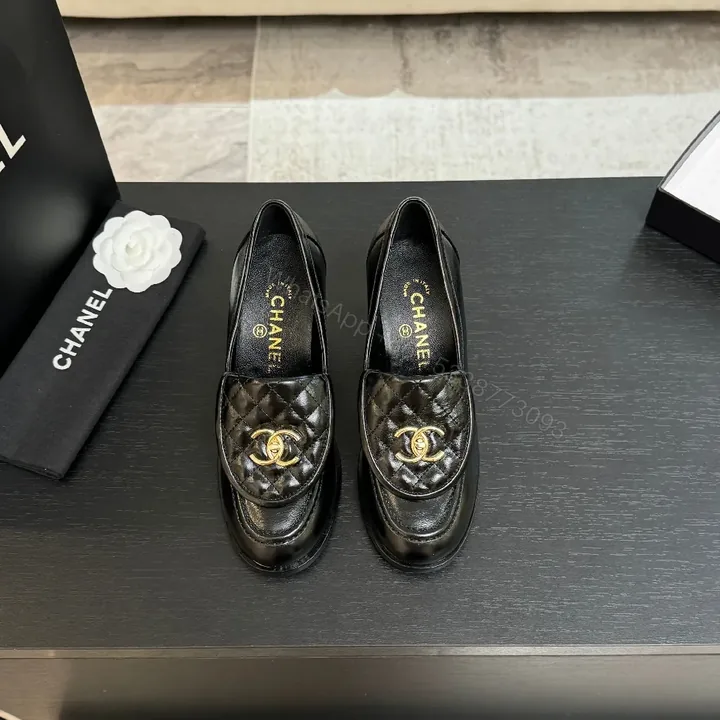 View 1 of Quilted Leather Loafers with Gold Logo, Chic Classic