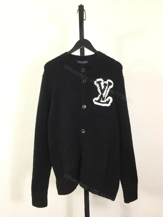 View 1 of Lux Black Textured Cardigan with White Logo Accent