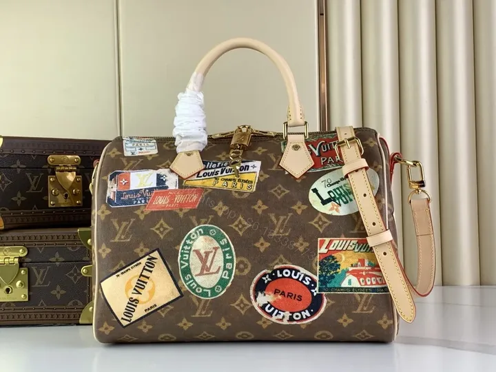 View 1 of Bold LV-Inspired Patch Satchel - Travel-Ready Satchel