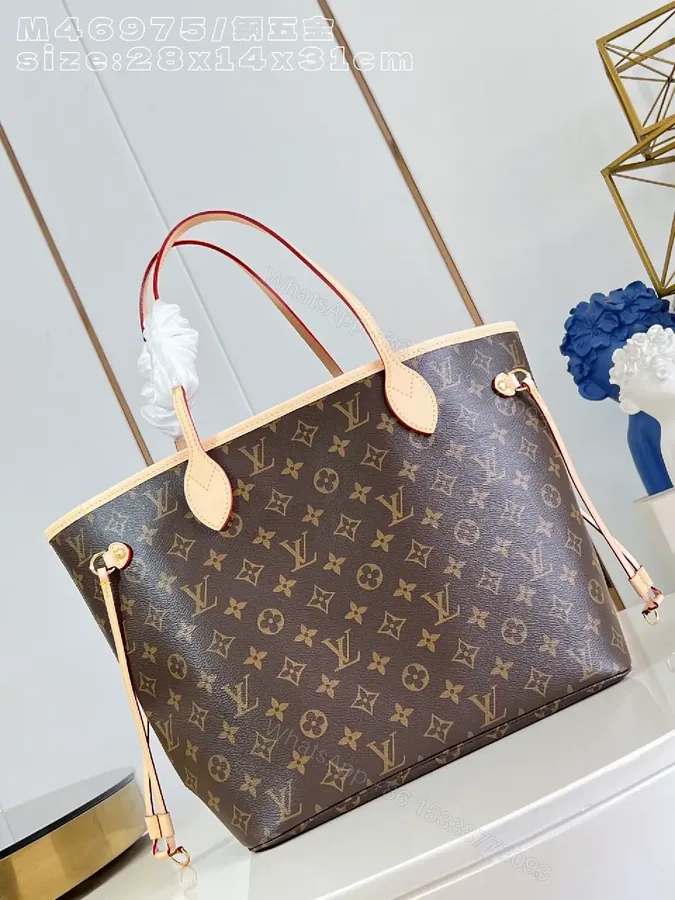 View 1 of Structured Monogram Tote: Leather, Classic, Ultra-Durable Carryall