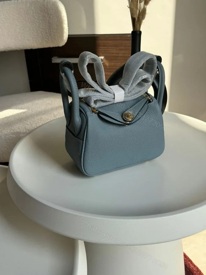 View 1 of Hermes Brand New Mini Lindy Nata Togo Palladium HDW