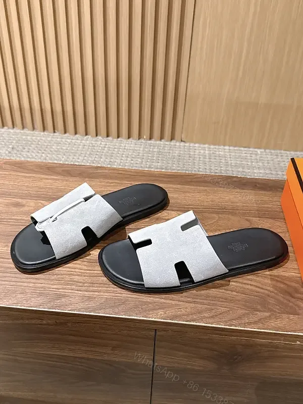 View 1 of Grey suede slide sandals with cutout strap for premium everyday luxury