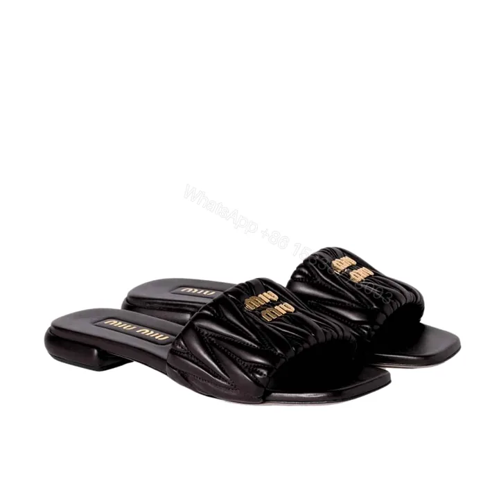 View 1 of MIUMIU MATELASSÉ NAPPA LEATHER SLIDES BLACK