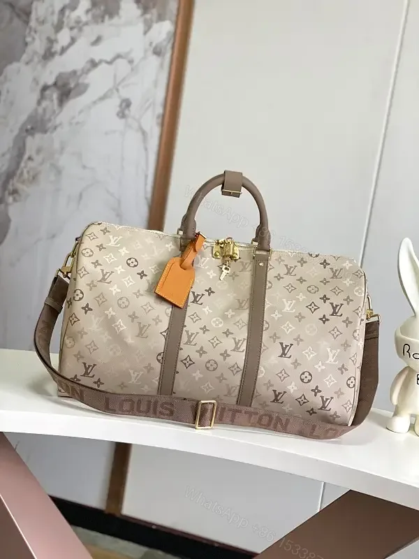View 1 of Light Taupe LV Monogram Duffle — Canvas, Leather Trim, Top Zip, Recessed Gold Hardware