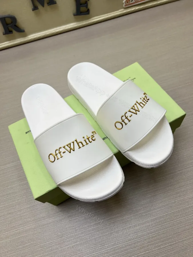 View 1 of White Slide Sandals: Gold-Embroidered Logo, Luxe Minimalist Comfort
