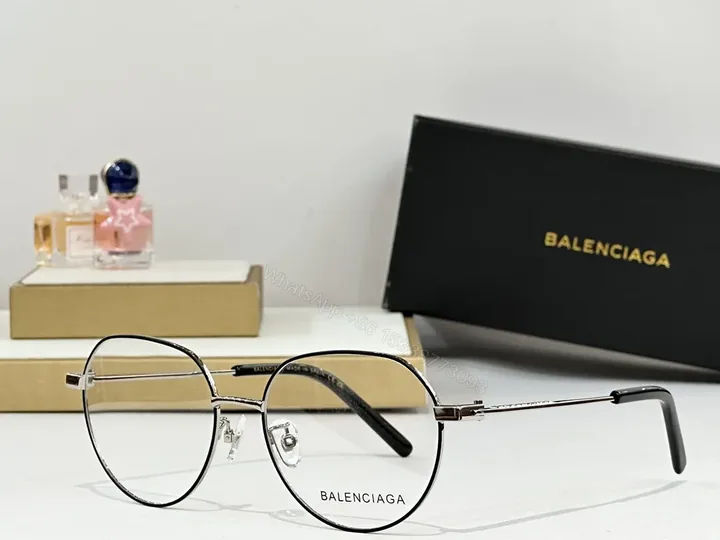 View 1 of Minimalist Black Round Glasses, Metal Frame, Anti-Reflective, Eyewear