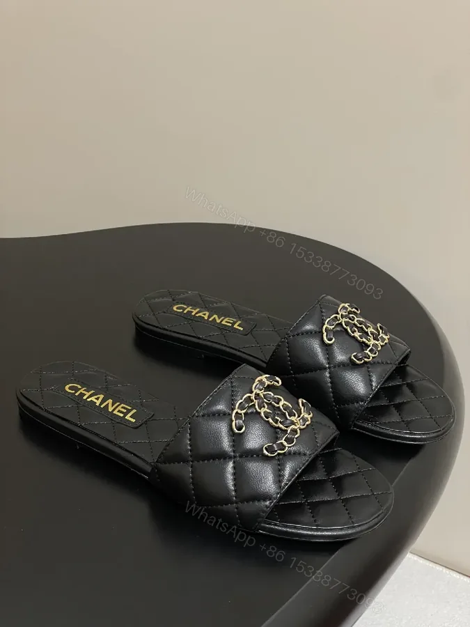 View 1 of Quilted Leather Slides with Gold Chain Detail Luxury