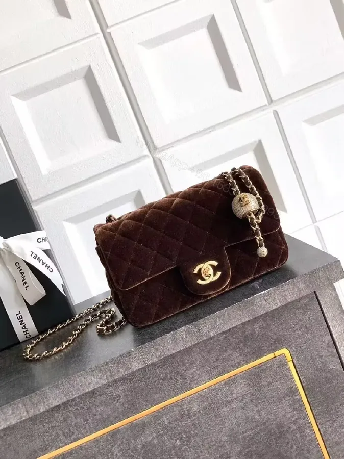 View 1 of Velvet Flap Bag with Gold Logo Chain, Compact Luxury