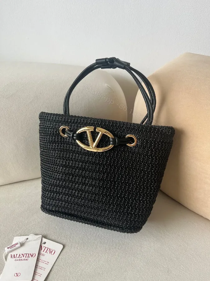 View 1 of Compact Black Knit Bag with Gold Hardware: Everyday Luxury Bag
