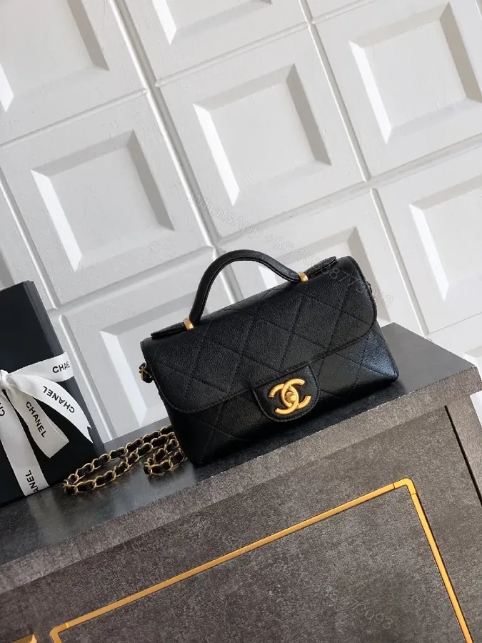 View 1 of Quilted Black Leather Bag with Gold Closure, Crossbody Glam