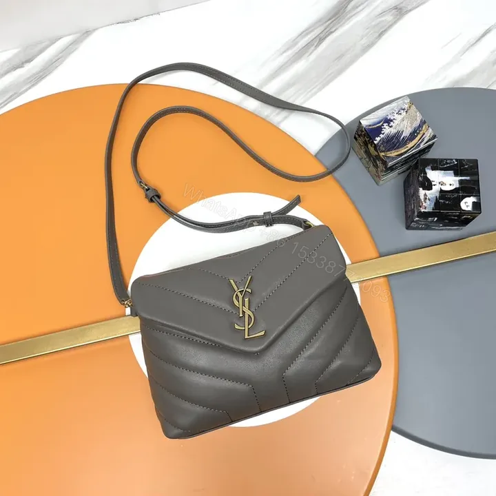 View 1 of Structured Gray Quilted Crossbody with Gold YSL Hardware Bag