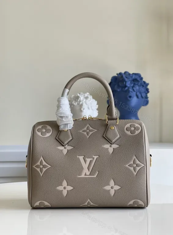 View 1 of Chic Monogram Satchel: Pebbled Calfskin Luxury Bag